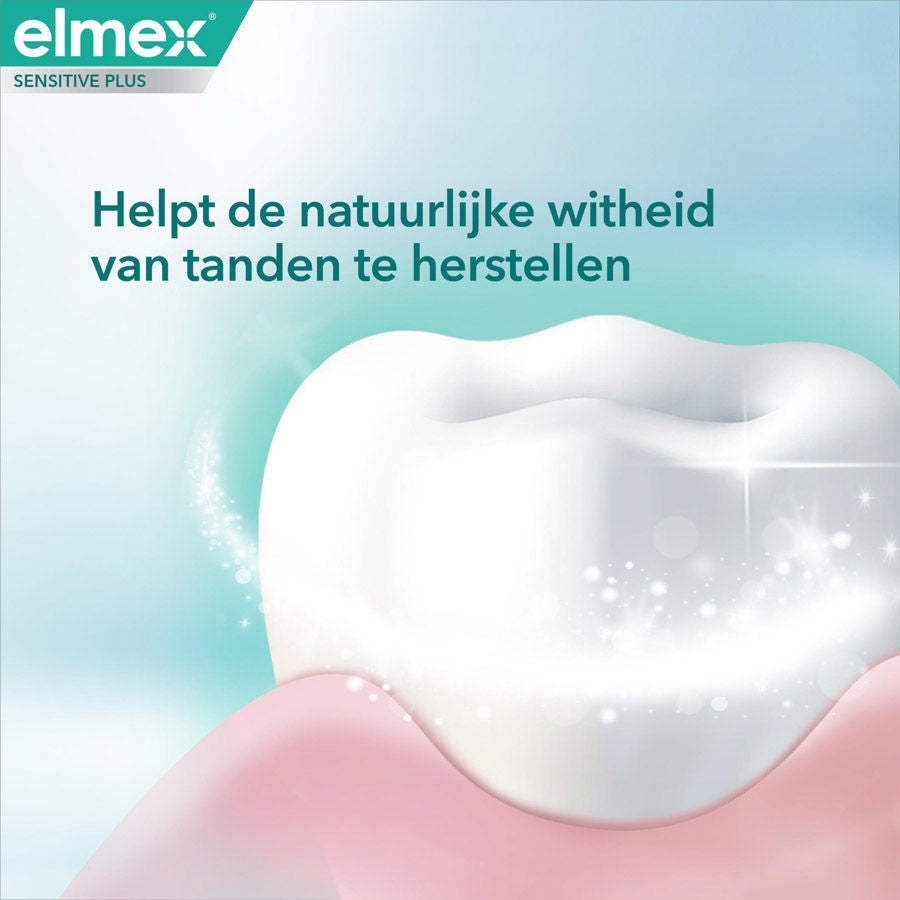 Close-up van een glanzende witte tand die het herstel van natuurlijke witheid door Elmex illustreert.